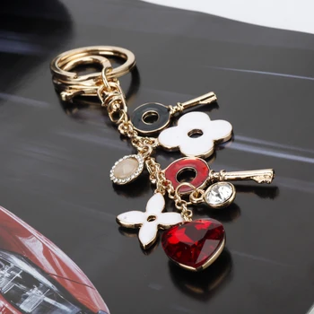 Módne Šperky Magické Kľúče Girll Sakura Červené Srdce Kvet Keychain Radi Autá Ženy Tašky Tlačidlo Držiaky Príslušenstvo Clef